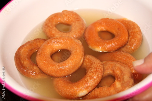 Preparing rosquilla en miel, dessert in Honduras, typical food