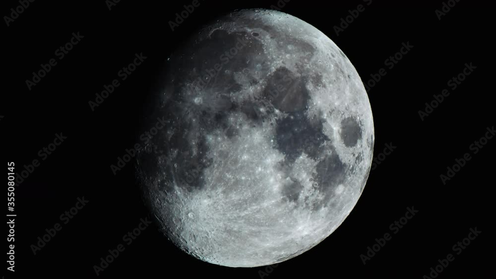 Closeup shot of the moon, filmed with a super tele lens in UHD Closeup shot of the moon, filmed with a super tele lens in UHD