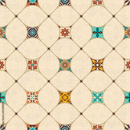Seamless colorful patchwork tile with Islam, Arabic, Indian, Ottoman motifs. Majolica pottery tile. Portuguese and Spain decor. Azulejo. Ceramic tile in talavera style. Mosaic tile