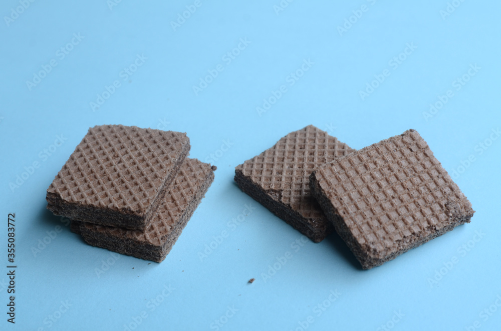 cocholate wafers with a blue background
cocholate wafers with a blue background