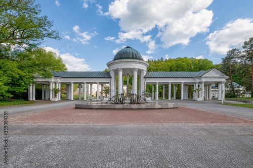 Pavilion of mineral water springs - white column colonnade in Marianske Lazne (Marienbad)