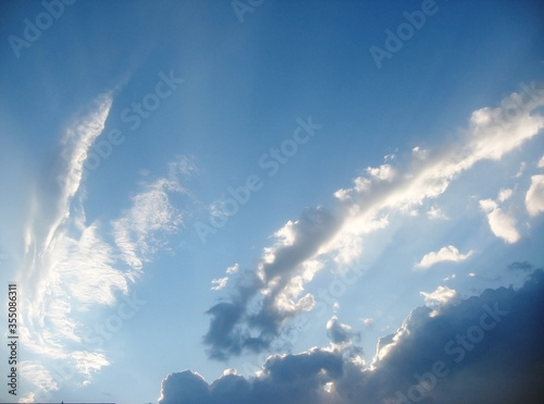Blue sky  sun and clouds