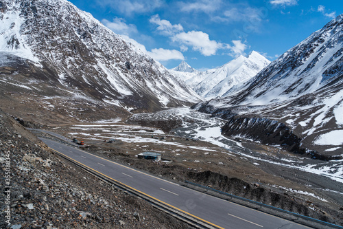 Road to Khunjerab pass border between Pakistan and China surrounded by Karakoram mountains range, Pakistan