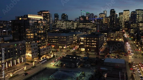 Aerial / drone evening footage of streets near Lake Union, downtown, in the commercial district of Seattle, Washington during the pandemic