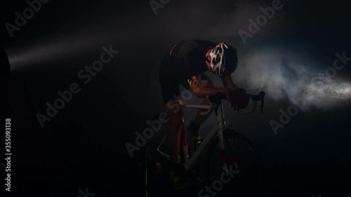 professional sportsman cycling road bike, sport concept, studio black background photo