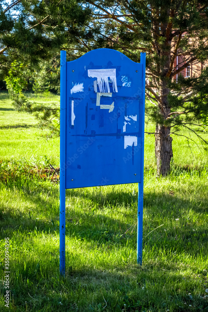 Blue metal message board on the street. Blue metal message board on the street.