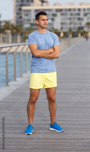 Sporty man posing outdoors