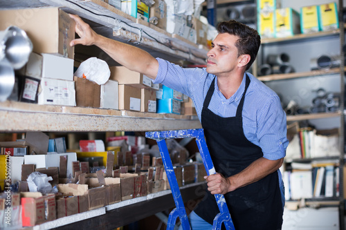  workman considers the small details in the boxes