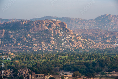 view of the ancient Anjanadri mountain in Hampi, Karnataka, India. © Abdul