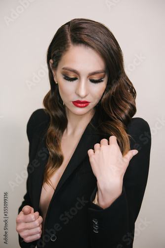 Young sexy woman wearing a black jacket