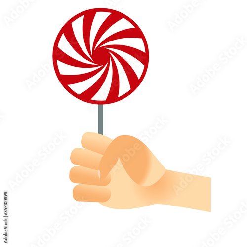hand holding lollipop