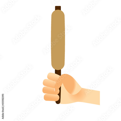 hand holding rolling pin