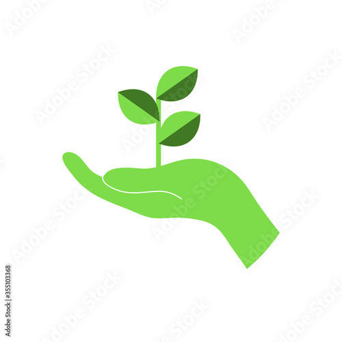 hand holding green leaf © Gus