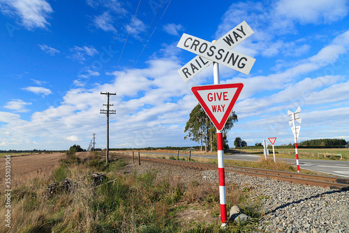Railway crossing and give way sign.
