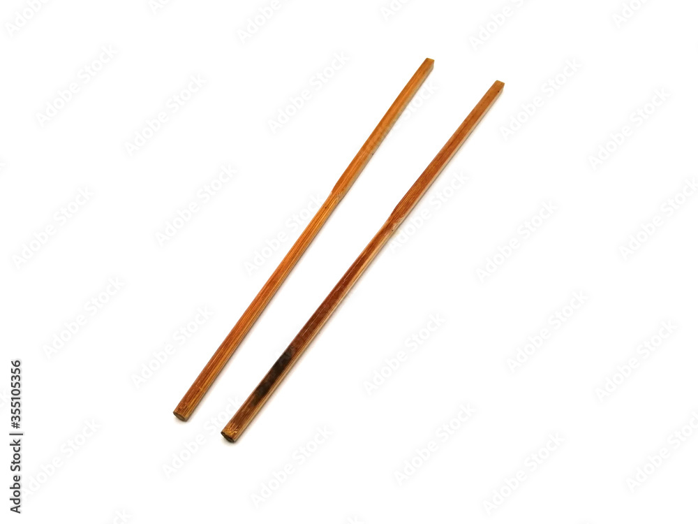 Close up of wooden chopsticks on white background Close up of wooden chopsticks on white background