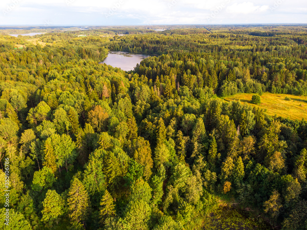 Beautiful panoramic view of Lake Seliger in in Ostashkovsky District of Tver Oblast in Russia.  Picturesque landscape Lake Seliger with islands, forests and hills.