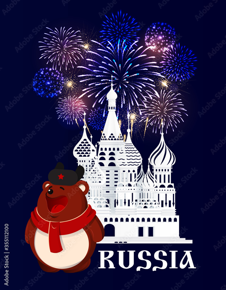 Russia. Moscow. Red Square. Brown bear in scarf and hat stays in front of St. Basil's Cathedral silhouette. Blue background with fireworks.