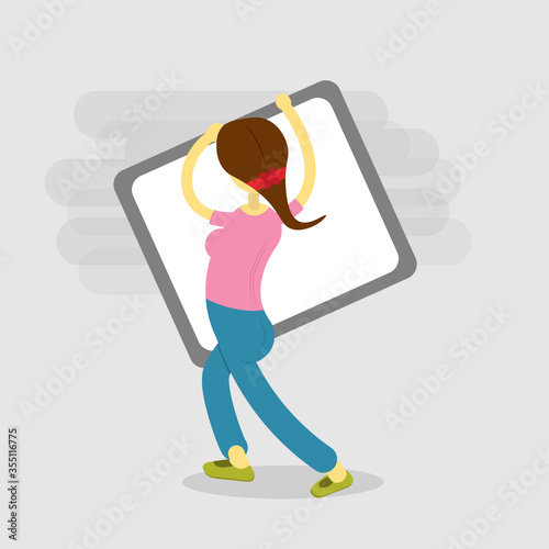 The girl stands with her back to the writing board