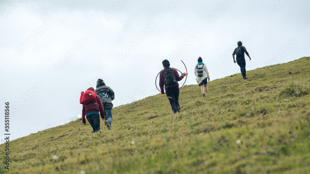 group of people walking in the countryside