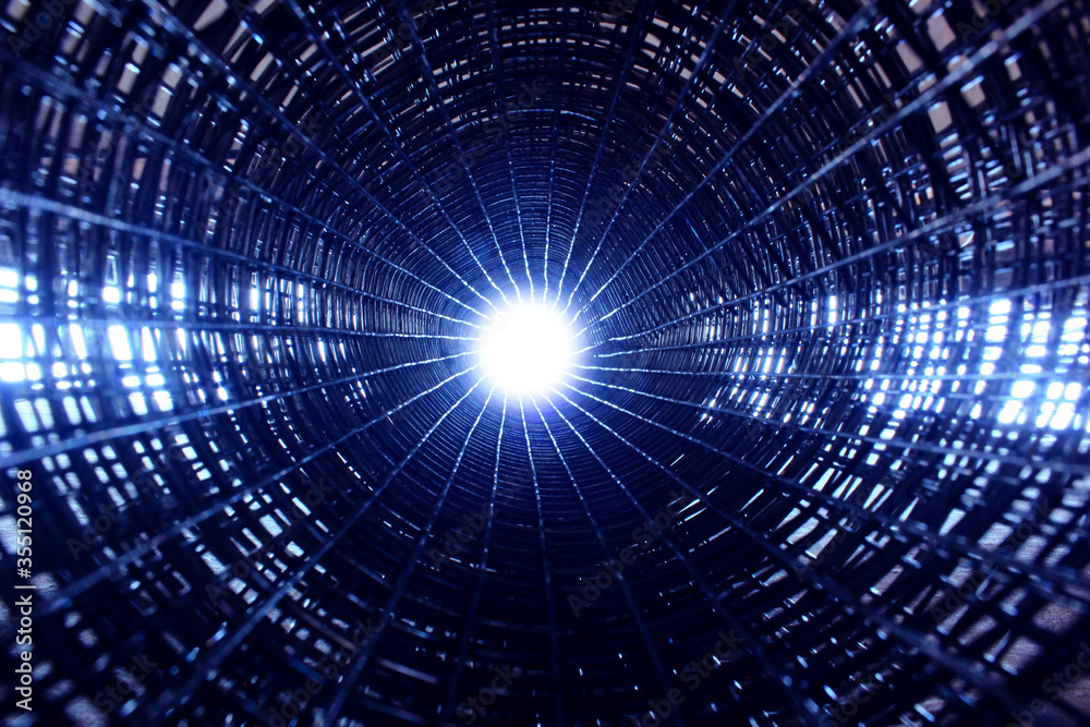 wire coils are kept in a circle so that they look like tubes with a light source at the end, making it look like a tunnel into the future, looking so futuristic that it matches the robotic theme wire coils are kept in a circle so that they look like tubes with a light source at the end, making it look like a tunnel into the future, looking so futuristic that it matches the robotic theme