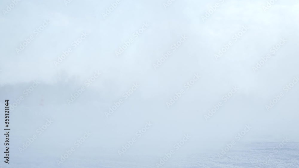 Sliding on an ice line. Snow drifting. Footage. Sport car racing on snow race track in winter. Driving a race car on a snowy road.