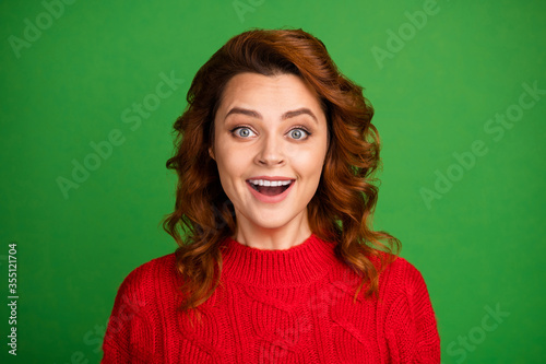 Portrait of astonished positive woman look good wonderful black friday novelty wear knitted pullover isolated over vivid color background