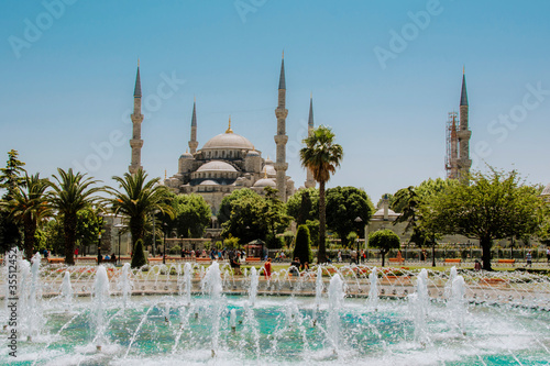 The Blue Mosque (Sultanahmet Camii) and fountain on the Sultanahmet (Hippodrome) Square in Istanbul, Turkey.