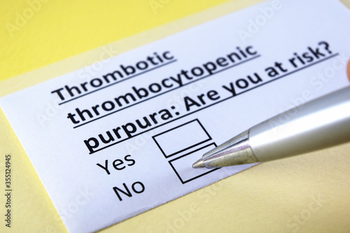 One person is answering question about thrombotic thrombocytopenic purpura. photo