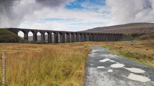 The iconic Ribblehead Viaduct or Batty Moss Viaduct which carries the Settle to Carlisle railway across Batty Moss in the Ribble Valley, Yorkshire Dales, UK photo