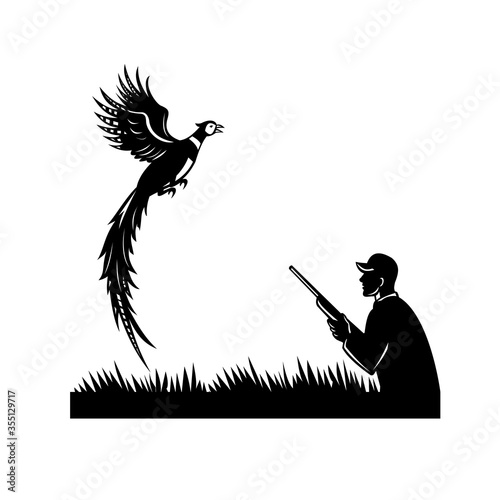 Silhouette of Bird Hunter with Rifle Hunting Pheasant Flying Up Retro Black and White photo