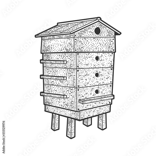 Beehive sketch engraving vector illustration. T-shirt apparel print design. Scratch board imitation. Black and white hand drawn image.