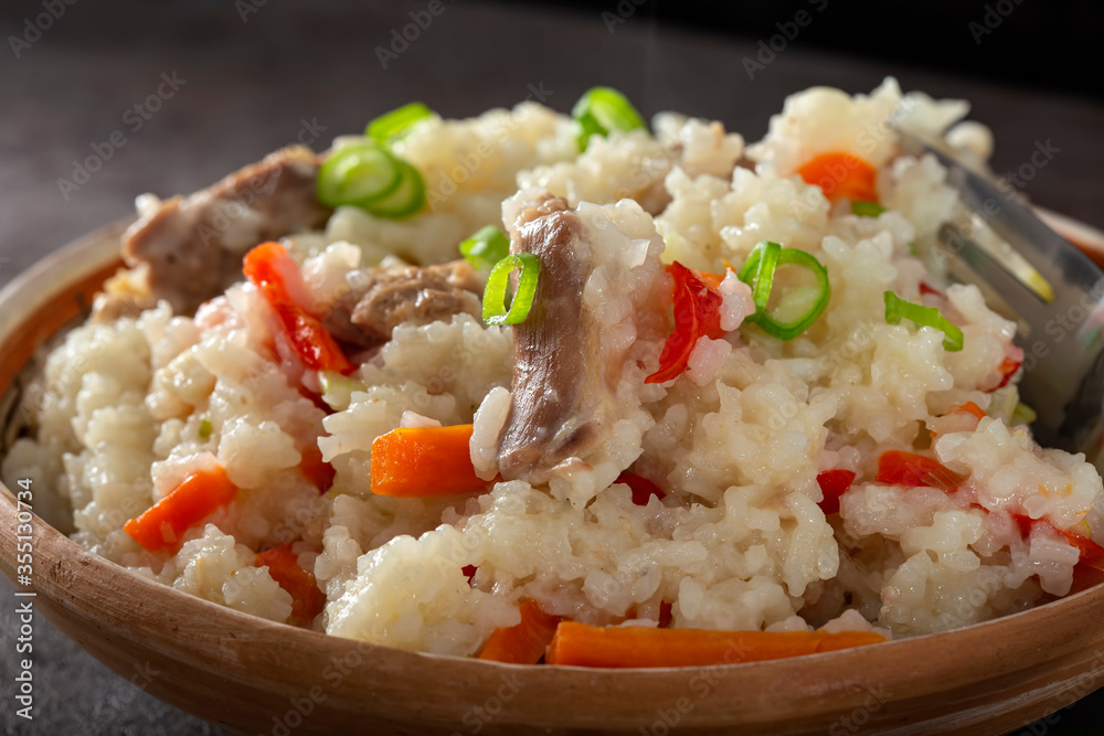 Rice stew with chicken meat and vegetables Rice stew with chicken meat and vegetables