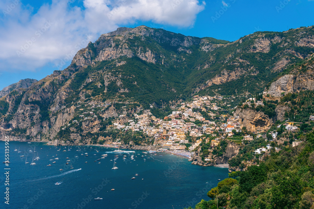 View of the landscape of the mountain town of Positano. Travel route best places in Italy. Opening of the tourism season after quarantine. The concept of tourism and travel.