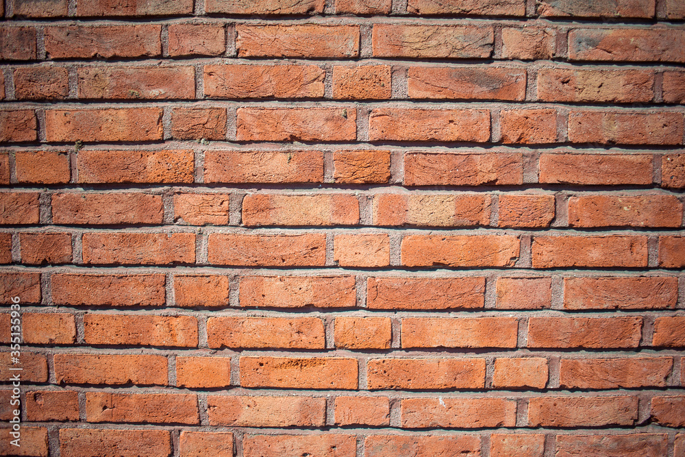 Old red brick wall with lots of character and individual texture. Old red brick wall with lots of character and individual texture.