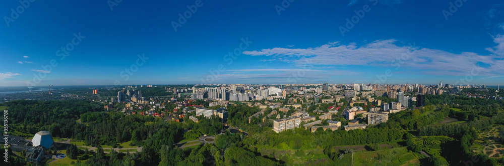 Aerial Panoramic shot in the summer afternoon over Pechersky district of Kiev from the Botanical Garden.
