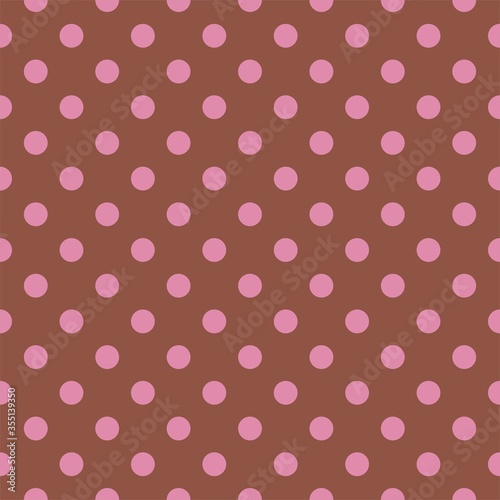 Seamless vector pattern with pastel pink polka dots on a dark chocolate brown background