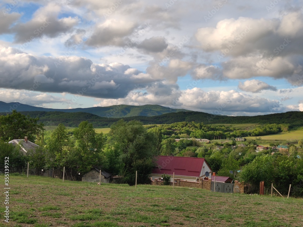 Summer landscape in the mountain Crimea on the Crimean peninsula with a view of the village