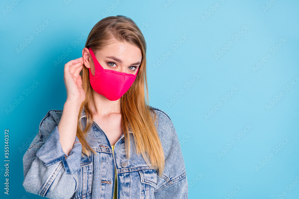 Closeup photo of pretty lady social distance concept not contact people look serious expression flirty eyes handsome guy wear protect face mask denim blazer isolated blue color background Closeup photo of pretty lady social distance concept not contact people look serious expression flirty eyes handsome guy wear protect face mask denim blazer isolated blue color background