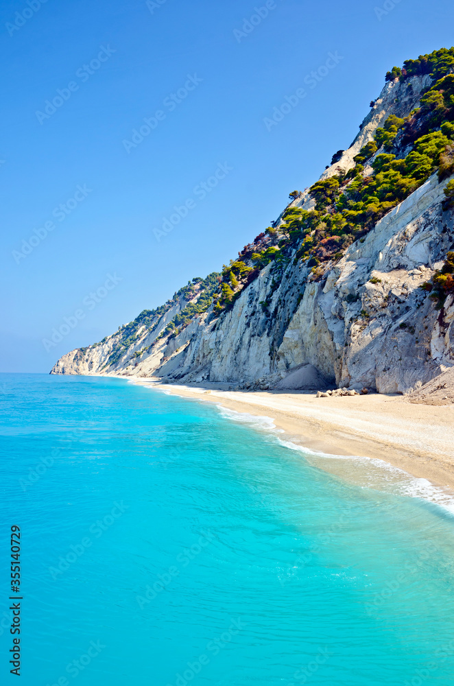 Wild beautiful empty beach. View of Egremni Beach in Lefkada, Greece, Ionian Sea.