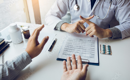 Doctor is talking about contraindications for treatment or taking medication for treatment.