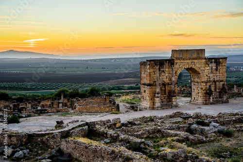 Volubilis is a partly excavated Berber city in Morocco situated near the city of Meknes, and commonly considered as the ancient capital of the kingdom of Mauretania.