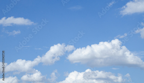 Blue sky with tiny clouds background.Clear sky with clouds. © Wipat