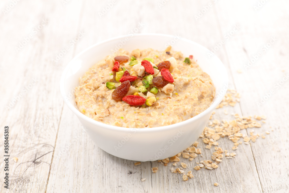porridge, oatmeal, cereal with milk and dried fruit porridge, oatmeal, cereal with milk and dried fruit
