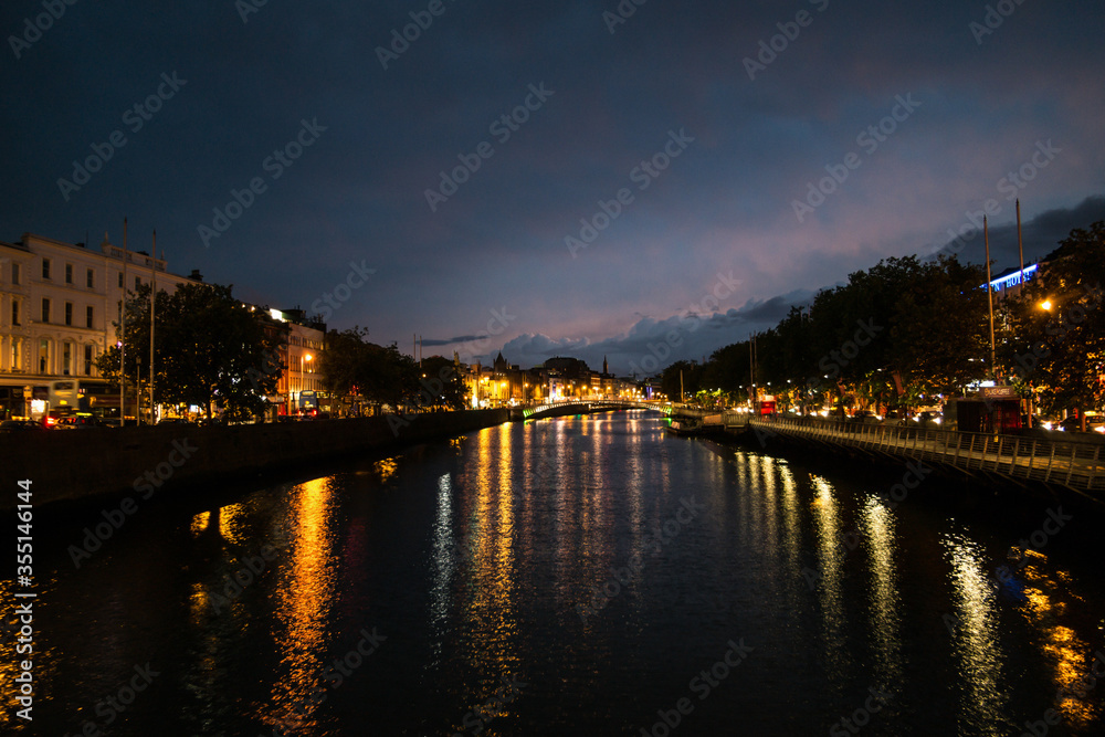 Liffey at night in Dublin , Dublin river, Ha’penny bridge at night