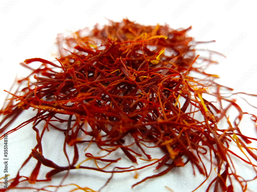 Naklejka premium saffron on white background, kesar, crocus, saffron background, pile of saffron,