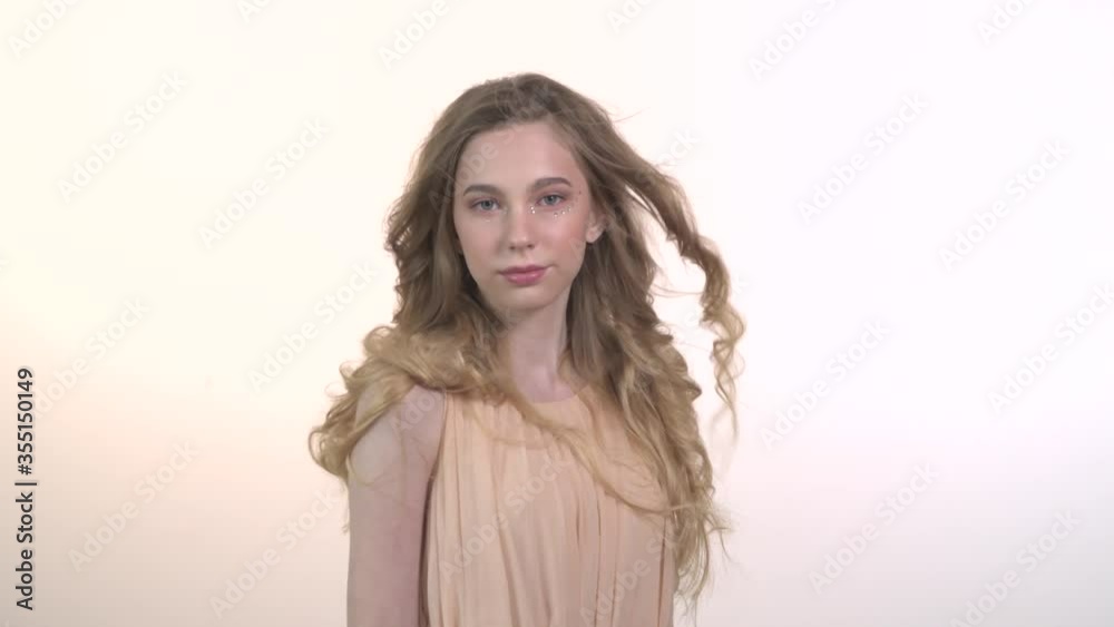 Beautiful blonde girl with long loose wavy hair. Beautiful blonde girl with long loose wavy hair.
