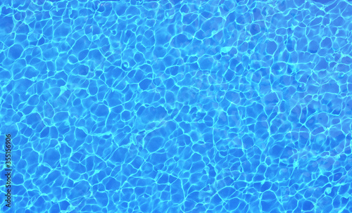 Swimming pool water background. Summer vacation concept. Top view