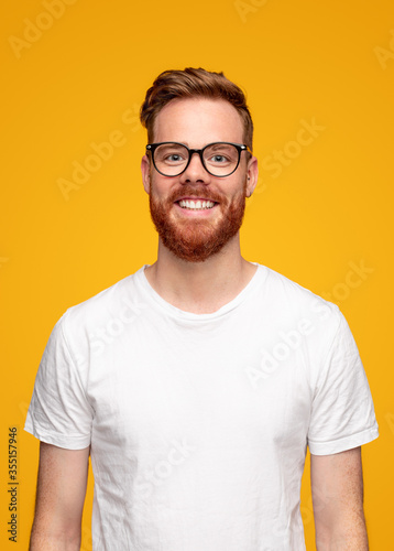Happy young man in white t shirt