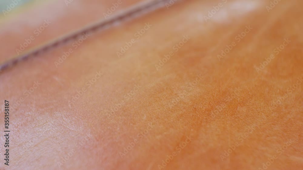 close up brown leather wallet. close up brown leather wallet.