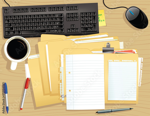 Desk top and stack of files